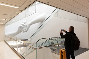 New ‘Reach’ Sculpture by Coby Kennedy and Hank Willis Thomas Installed At Chicago O’Hare Airport