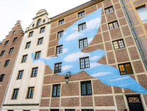 Monumental Collages Bring René Magritte's Art to Life in Brussels