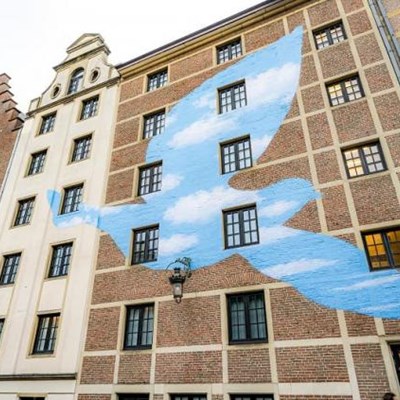Monumental Collages Bring René Magritte's Art to Life in Brussels