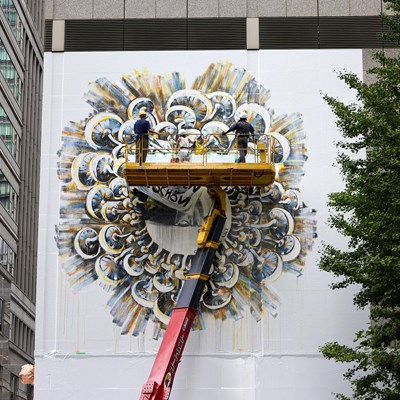 Belgian Artist Charlotte De Cock creates a Mural in the Center of Tokyo