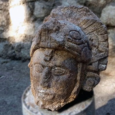 Sculpted Head of a Warrior with Serpent Helmet found at Chichen Itza Mexico