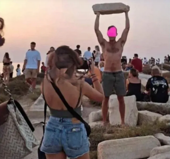 Tourist lifting Ancient Marbles on Naxos, Greece, triggers Outrage